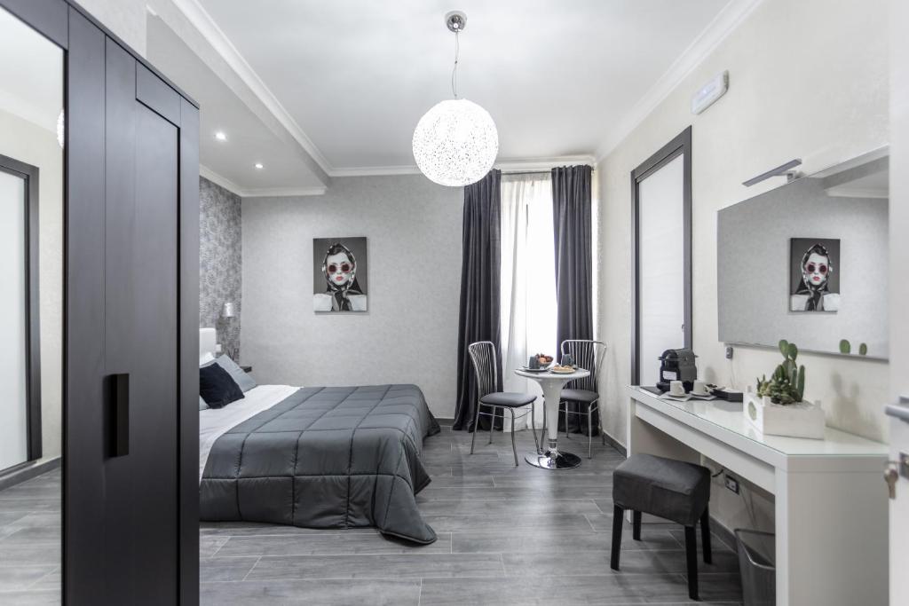 Postel nebo postele na pokoji v ubytování B&B Notti d'Oriente