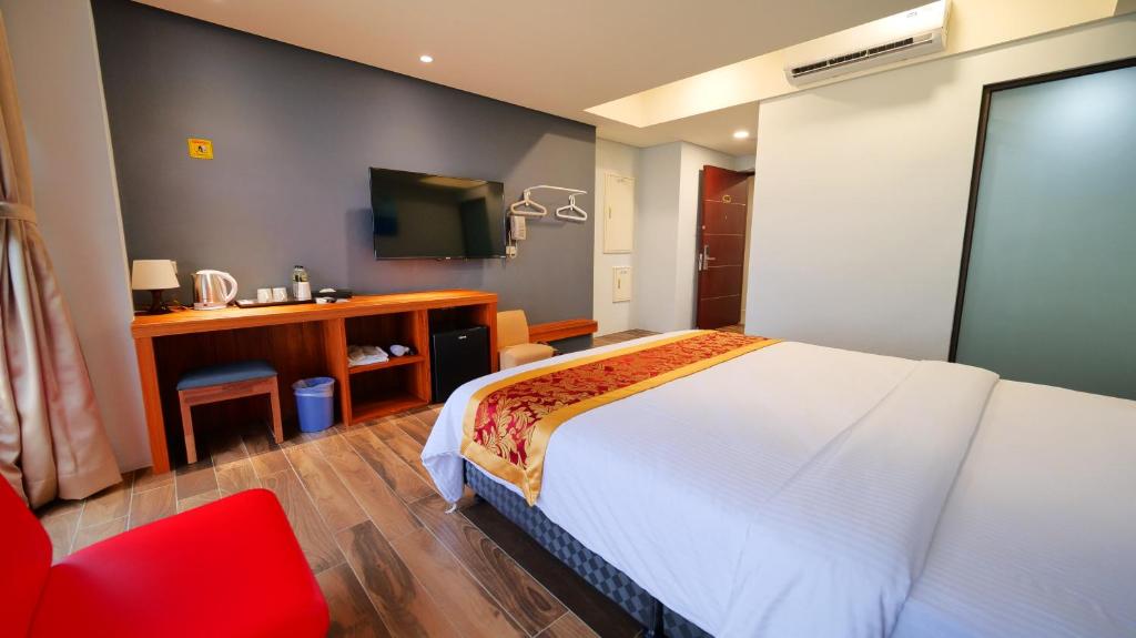 TV a/nebo společenská místnost v ubytování Apause Hotel