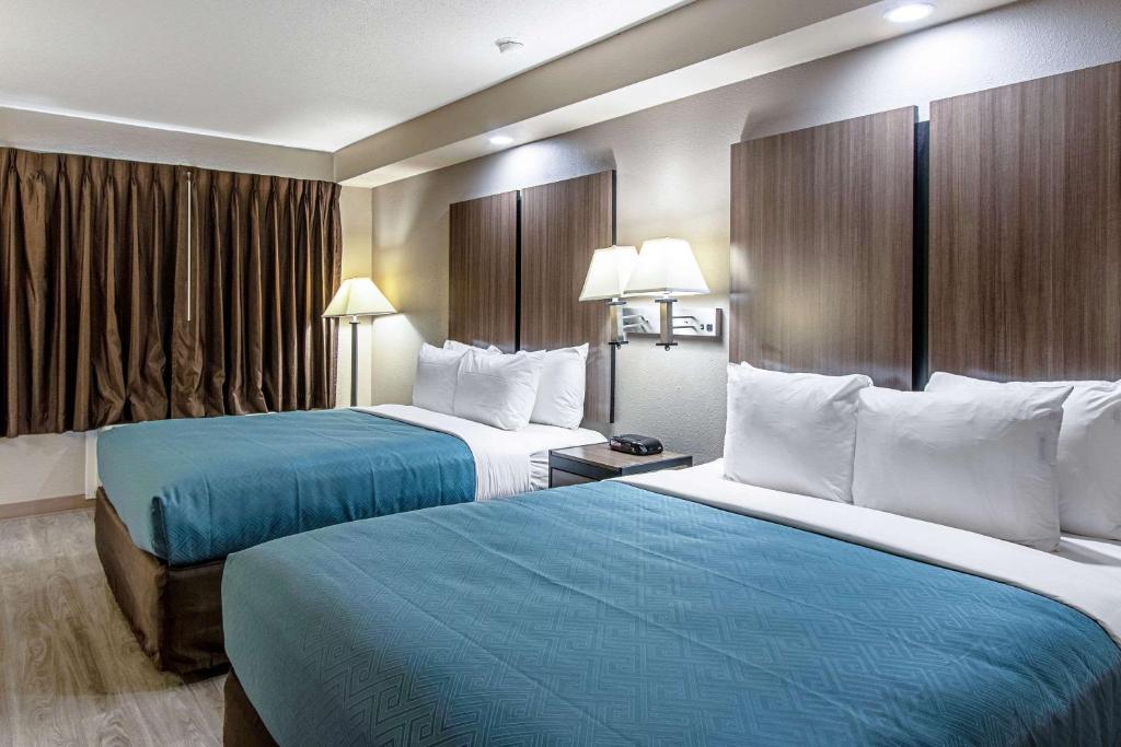 Letto o letti in una camera di Econo Lodge Kingsville