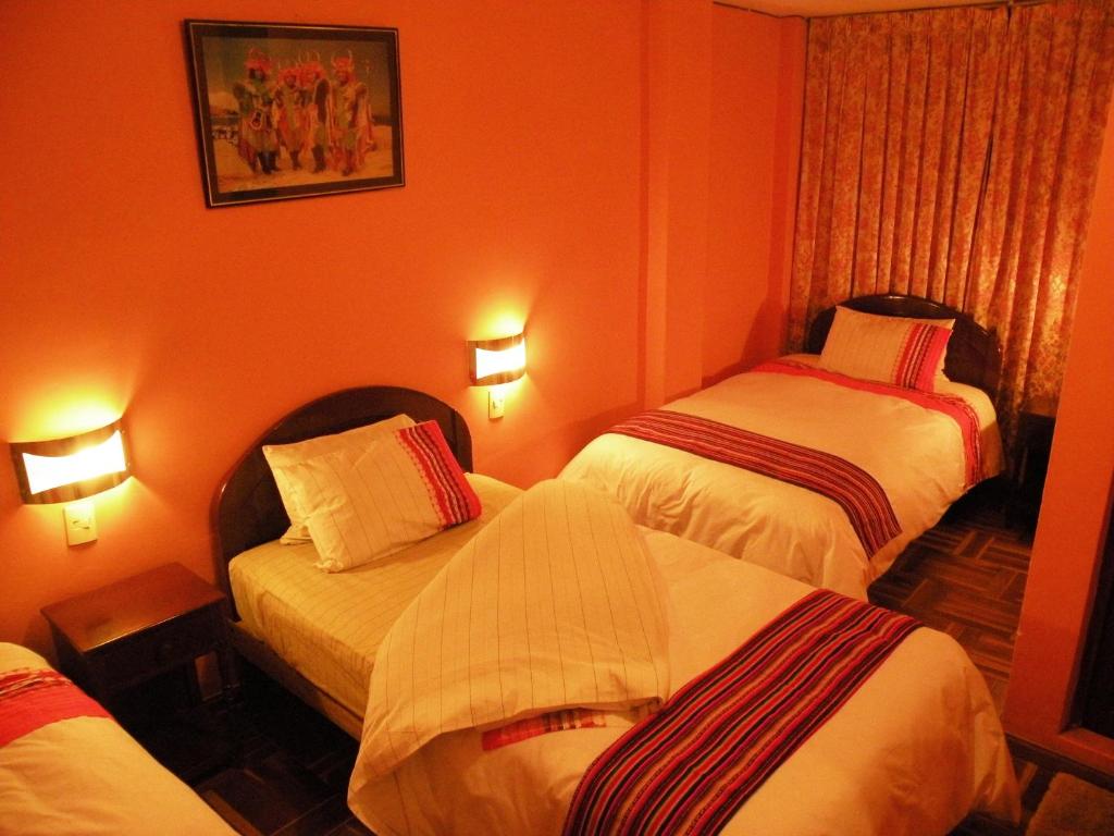 Postel nebo postele na pokoji v ubytování Hotel Margarita