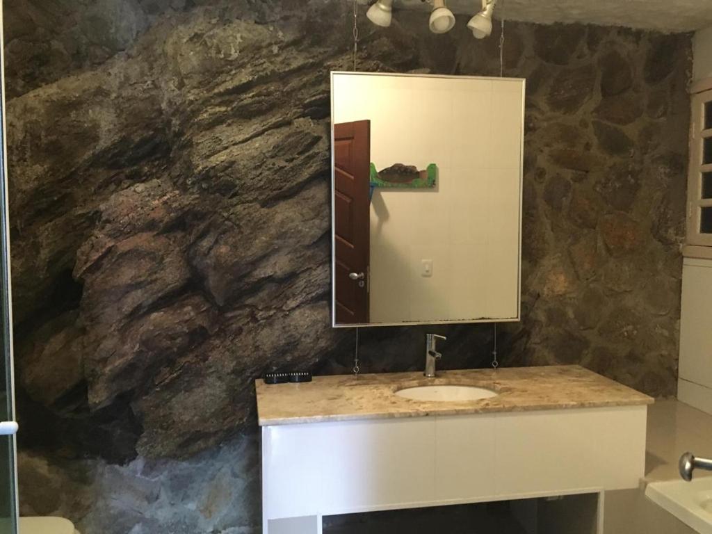 Um banheiro em Pousada Casa Atlântica