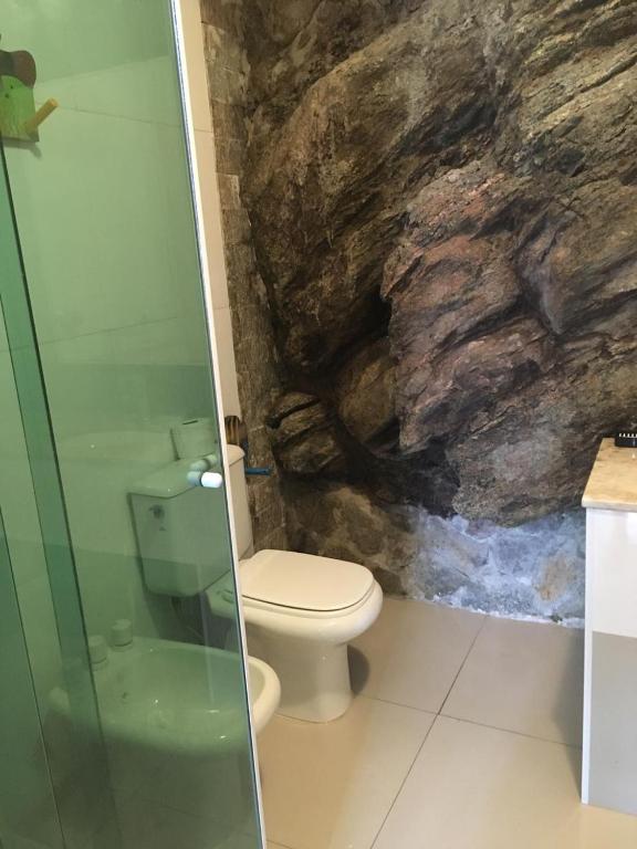 Um banheiro em Pousada Casa Atlântica
