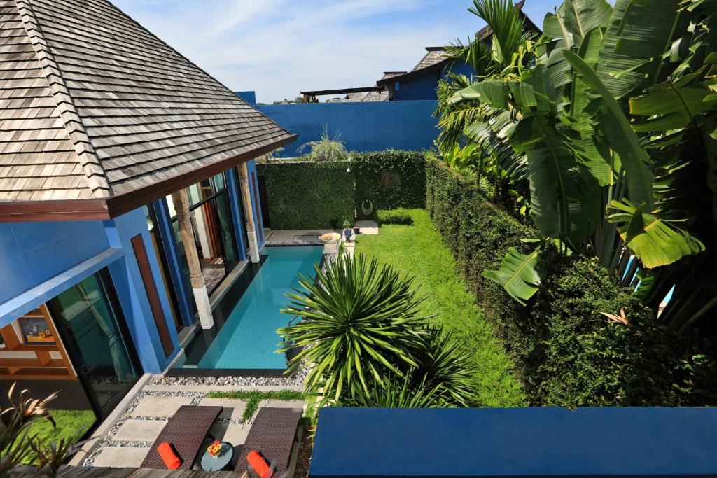 an overhead view of a backyard with a swimming pool at 3BDR Pool villa at Bangtao Wings #45 in Bang Tao Beach