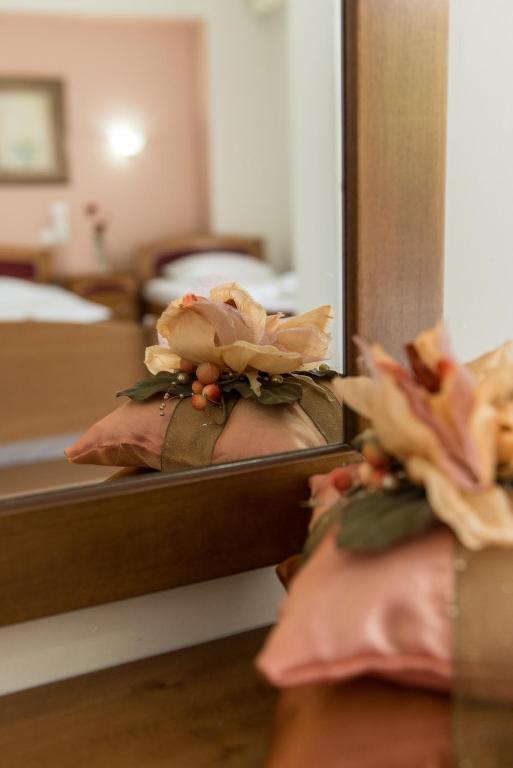 Postel nebo postele na pokoji v ubytování Hotel Alexandros
