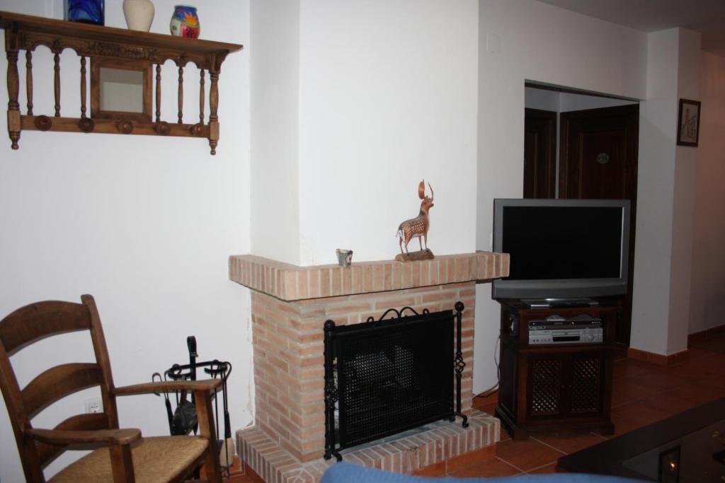 TV a/nebo společenská místnost v ubytování Vivienda Rural Casablanca - Wifi