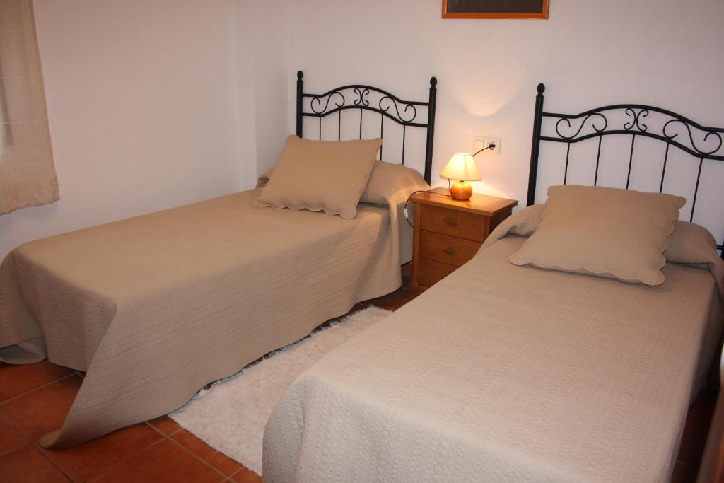 Postel nebo postele na pokoji v ubytování Vivienda Rural Casablanca - Wifi