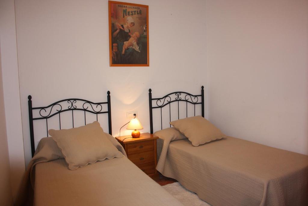 Postel nebo postele na pokoji v ubytování Vivienda Rural Casablanca - Wifi