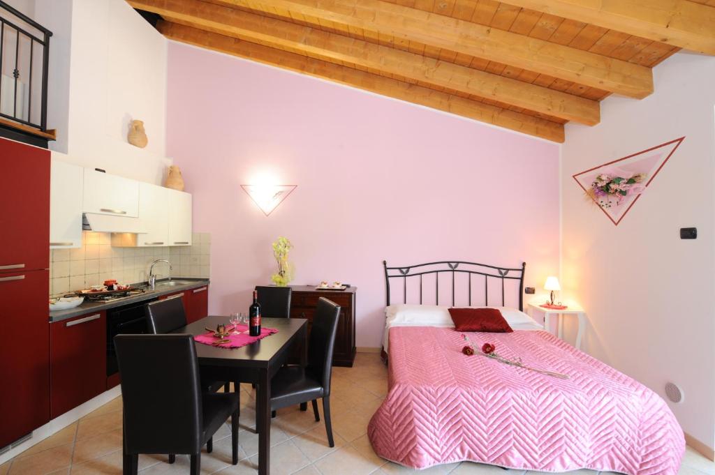 A bed or beds in a room at Agriturismo Terra E Sole