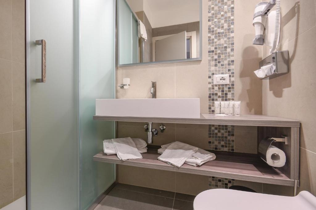 Koupelna v ubytování Hotel Oliveto