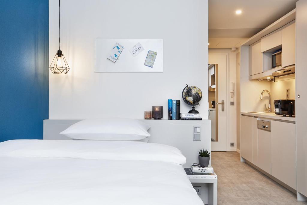 H.ome Serviced Apartments München - Resim 18