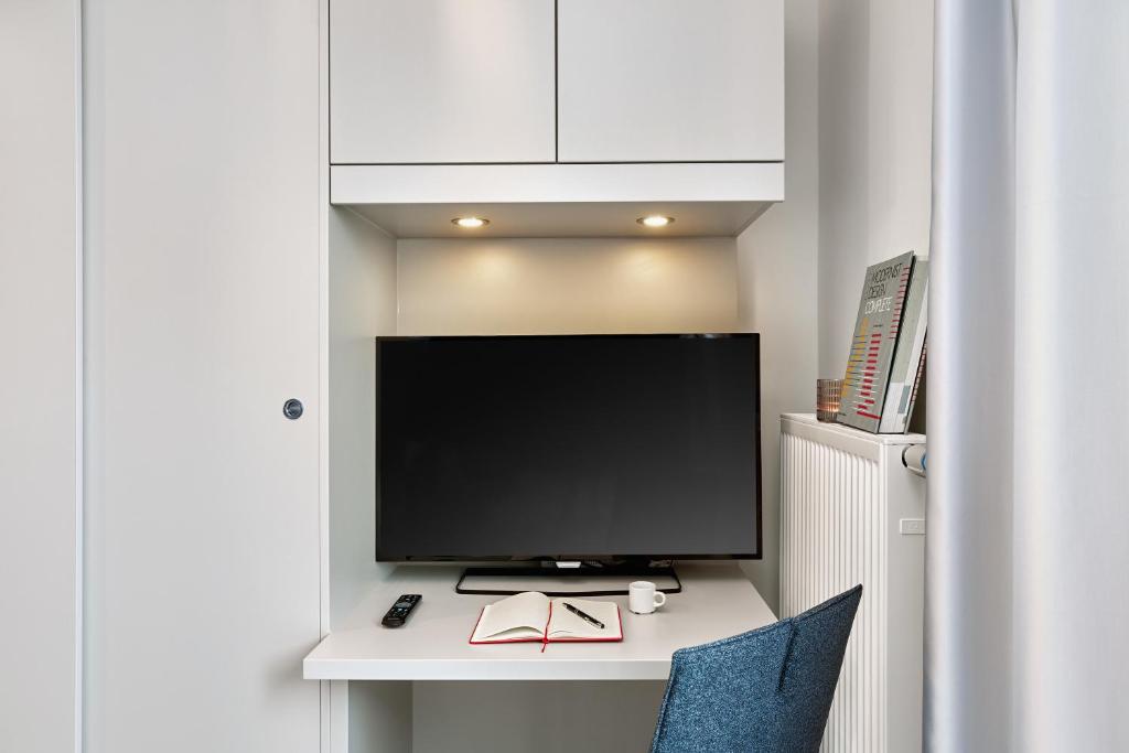 H.ome Serviced Apartments München - Resim 30