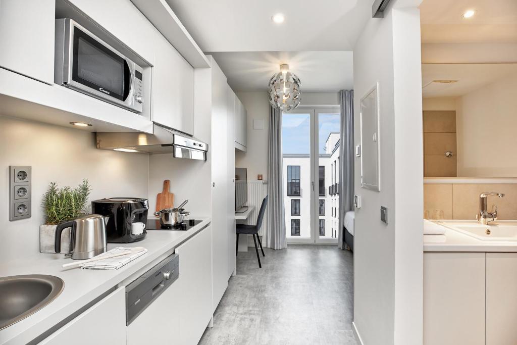 H.ome Serviced Apartments München - Resim 13