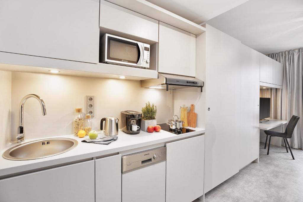 H.ome Serviced Apartments München - Resim 23