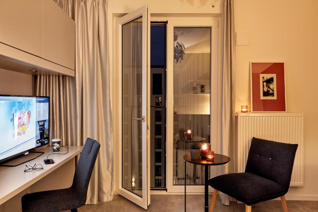 H.ome Serviced Apartments München - Resim 22