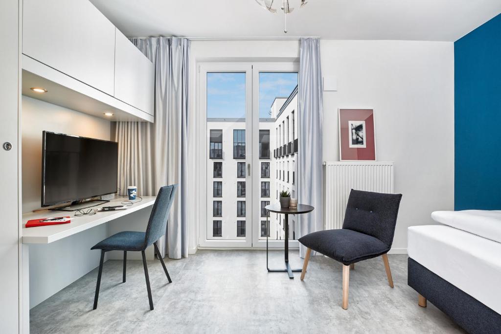 H.ome Serviced Apartments München - Resim 21