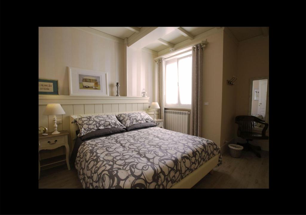 Postel nebo postele na pokoji v ubytování Serendipity B&B Pescara
