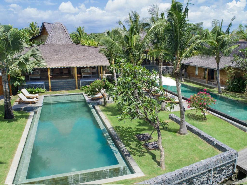 an aerial view of a villa with a swimming pool at Villa Mannao Estate in Kerobokan