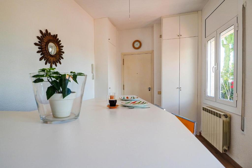 Kuchyň nebo kuchyňský kout v ubytování Secret Garden Apartment by Hello Homes Sitges