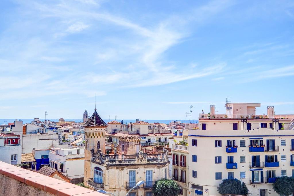Nespecifikovaný výhled na destinaci Sitges nebo výhled na město při pohledu z apartmánu