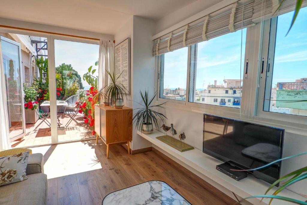 Posezení v ubytování Secret Garden Apartment by Hello Homes Sitges