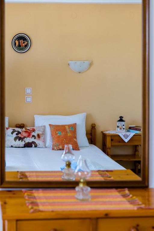 Łóżko lub łóżka w pokoju w obiekcie Antonios Apartments Stegna