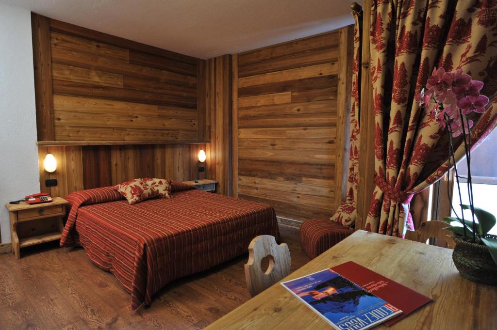 Postel nebo postele na pokoji v ubytování Hotel Rendez-Vous - Aymavilles