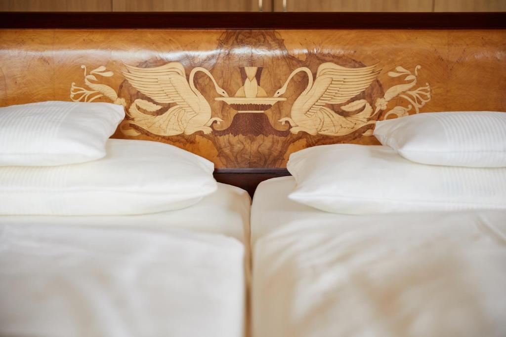 Postel nebo postele na pokoji v ubytování Hotel Prinz-Luitpold-Bad