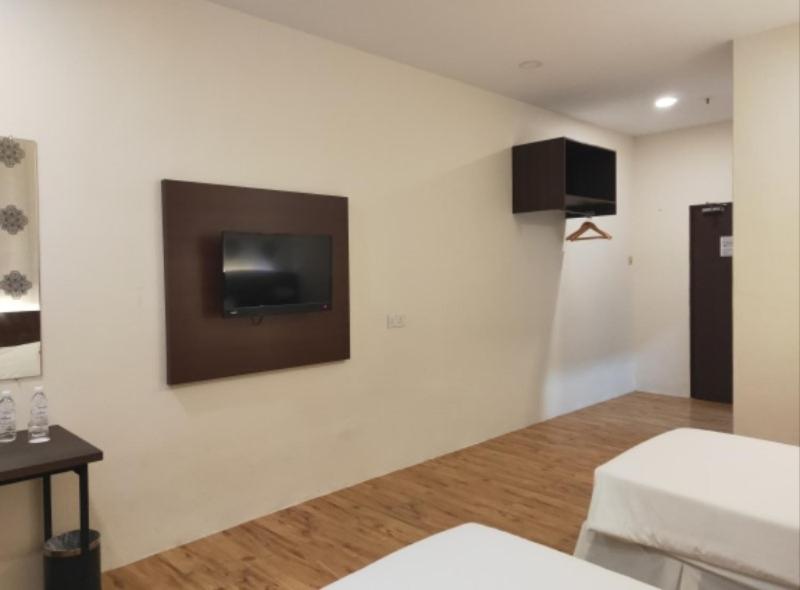 TV a/nebo společenská místnost v ubytování Casa Bonita Hotel