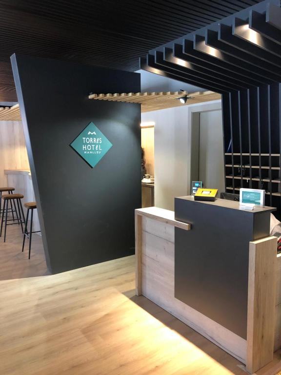 Kuchyň nebo kuchyňský kout v ubytování Hotel Torres Manlleu