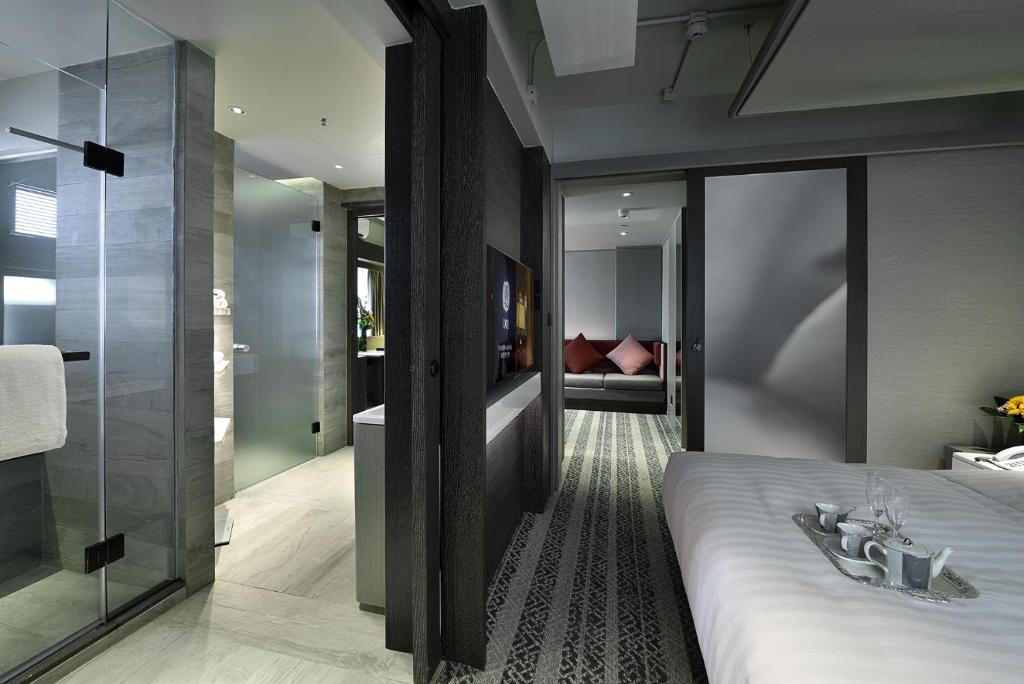 Letto o letti in una camera di Xi Hotel