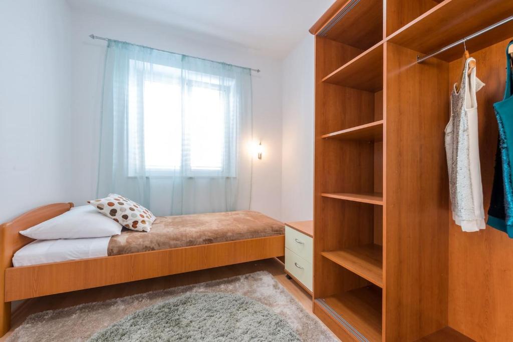 Postel nebo postele na pokoji v ubytování Luxury apartment Tara