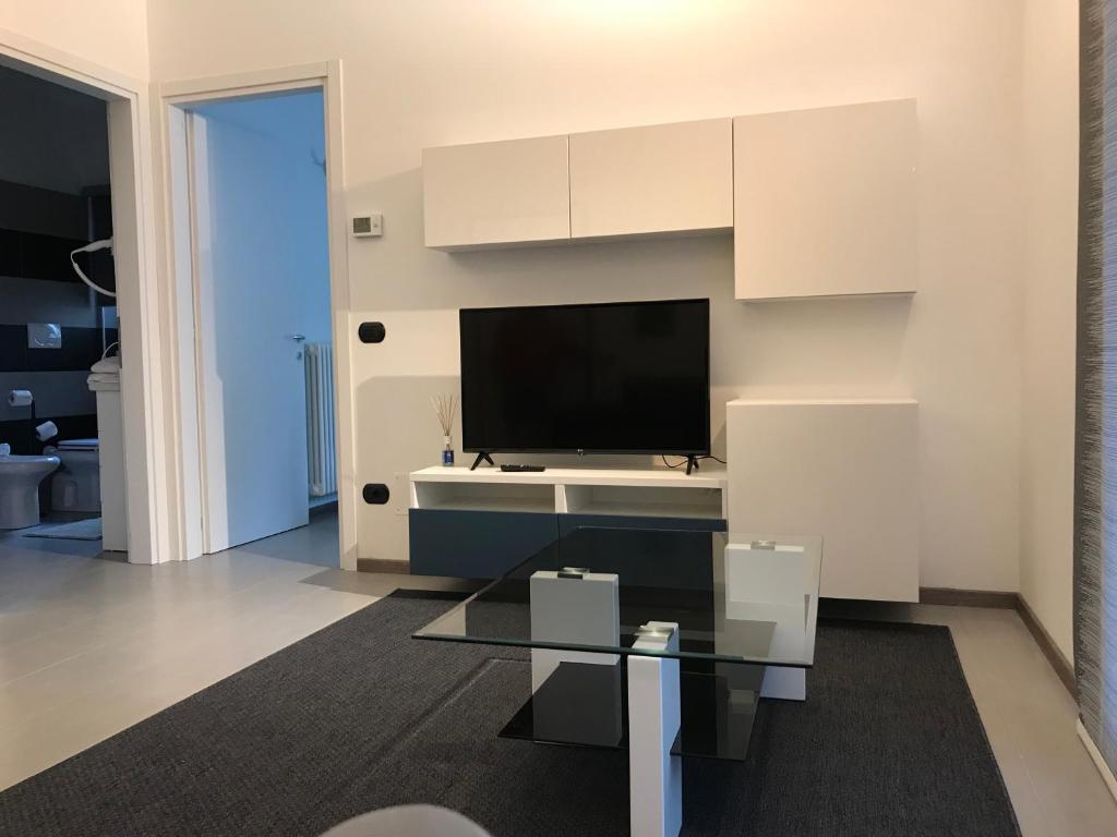 TV a/nebo společenská místnost v ubytování Hotel Residence Alessandra