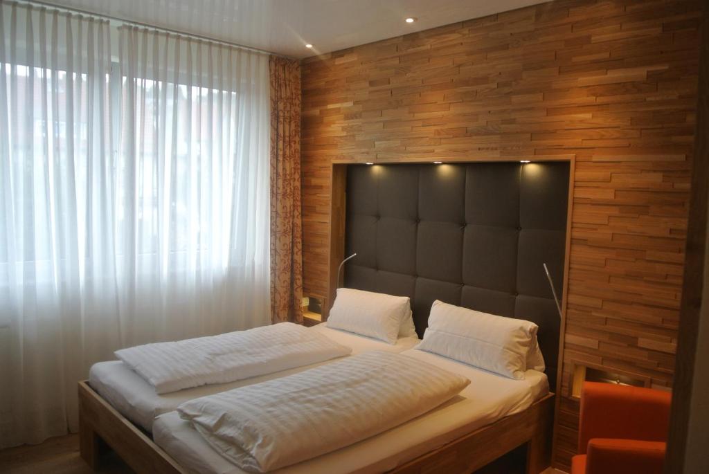 Postel nebo postele na pokoji v ubytování Hotel Jägerhof