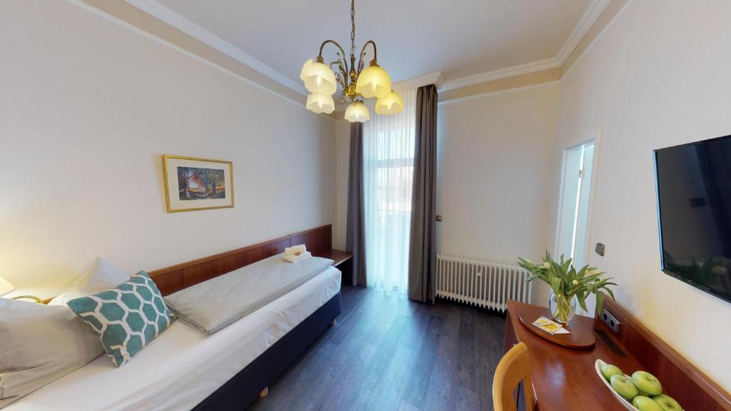 TV a/nebo společenská místnost v ubytování Hotel Residenz23