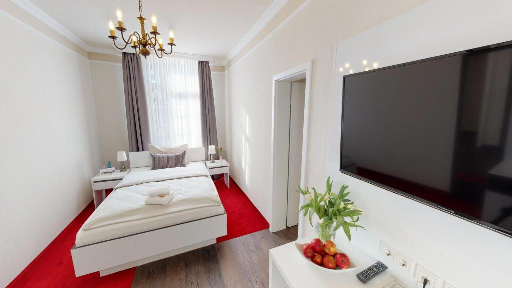 Postel nebo postele na pokoji v ubytování Hotel Residenz23