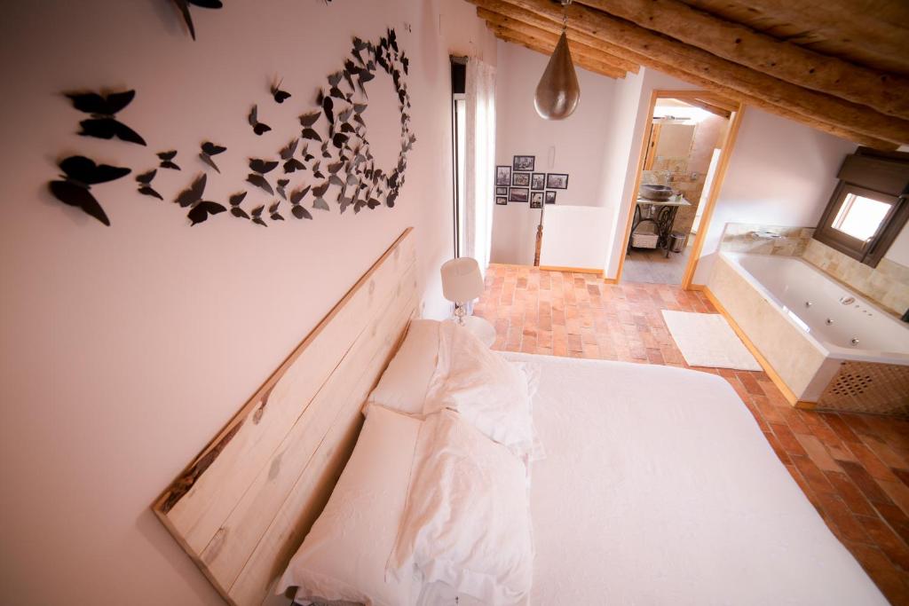 Postel nebo postele na pokoji v ubytování El Zaguán
