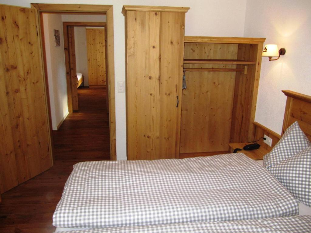 Postel nebo postele na pokoji v ubytování Hotel Bristol