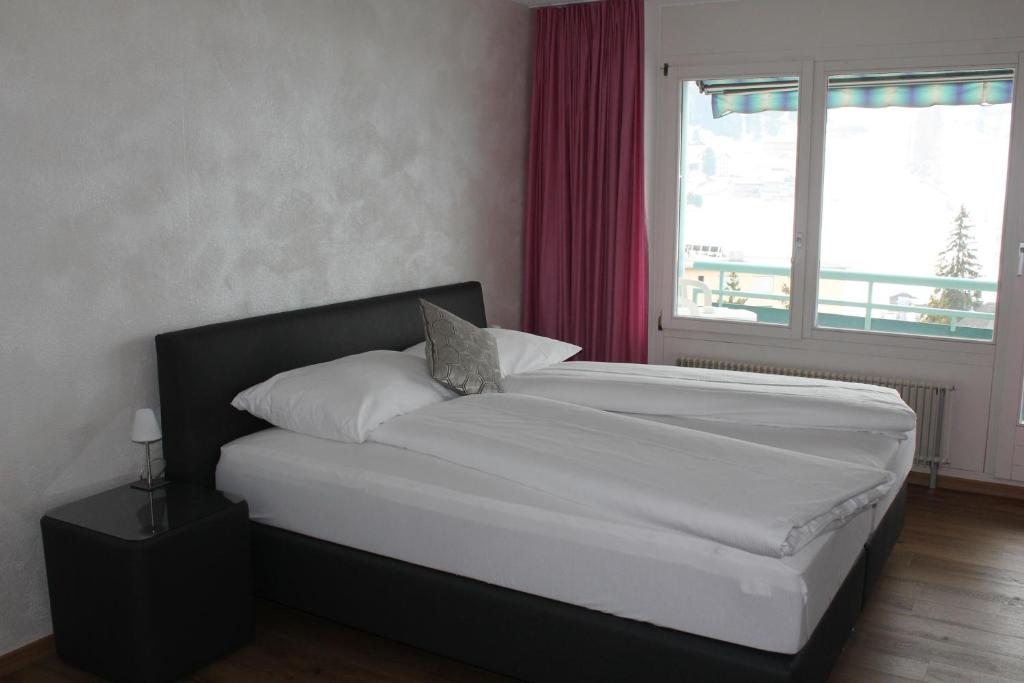 Postel nebo postele na pokoji v ubytování Bernina Bed and Breakfast