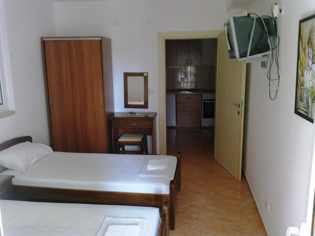 Letto o letti in una camera di Oaza Guest House