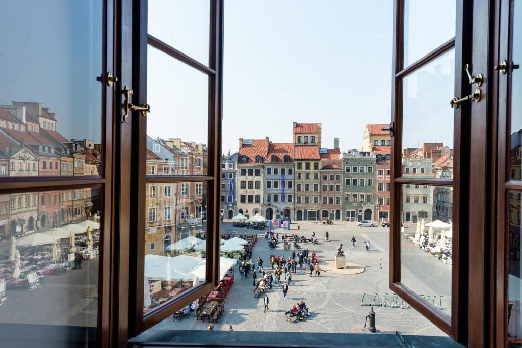a view from a window of a city street at Old Town Home in Warsaw