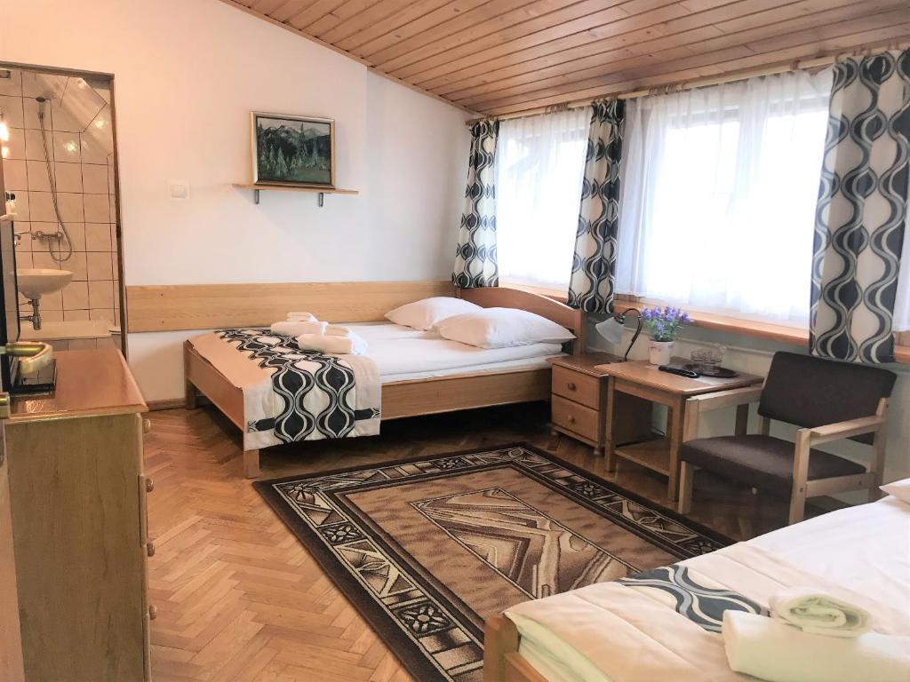 Posteľ alebo postele v izbe v ubytovaní Pensjonat Adria