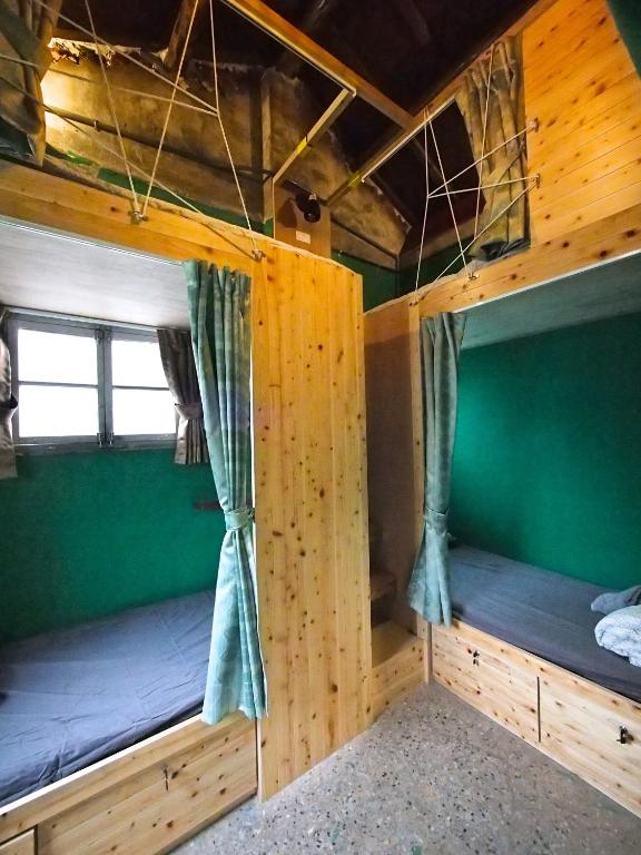 Letto o letti in una camera di A Touch of Zen
