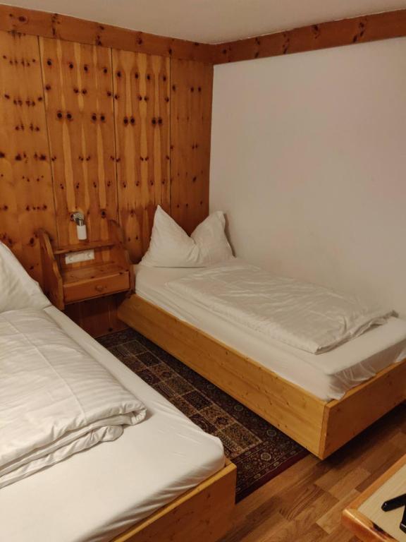 Postel nebo postele na pokoji v ubytování Pension Eder - Joker card included in summer