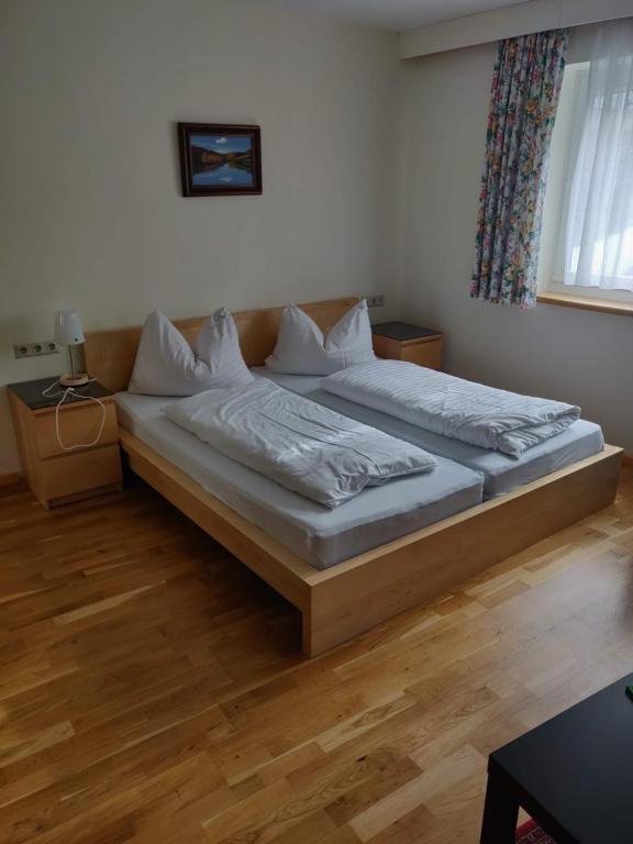 Postel nebo postele na pokoji v ubytování Pension Eder - Joker card included in summer