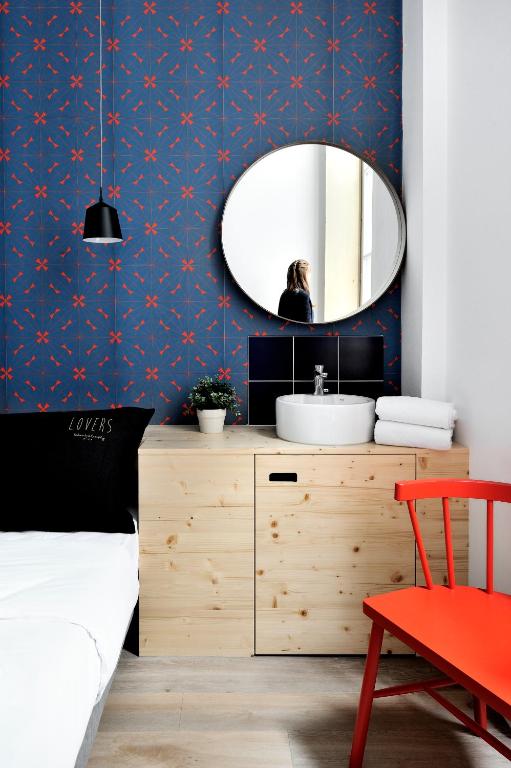 Postel nebo postele na pokoji v ubytování SLO Hostel Lyon les Pentes