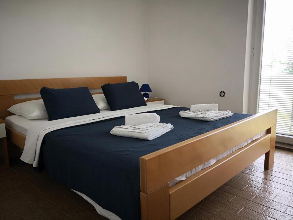Postel nebo postele na pokoji v ubytování Guesthouse Dupin