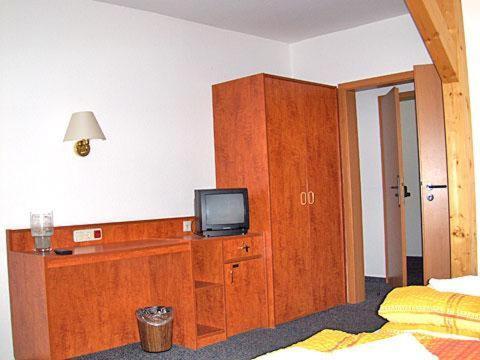 Postel nebo postele na pokoji v ubytování Desperados Hotel