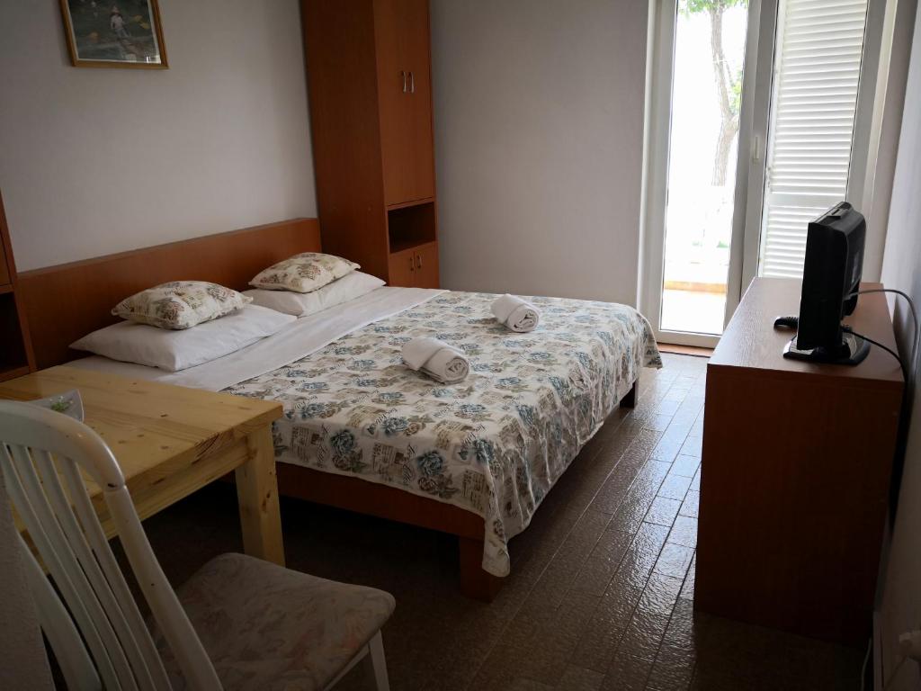 Postel nebo postele na pokoji v ubytování Guesthouse Dupin