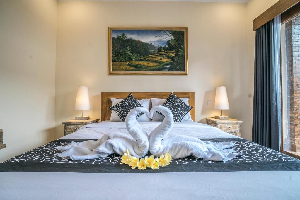 Postel nebo postele na pokoji v ubytování Saka House