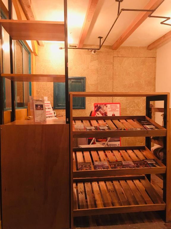 Postel nebo postele na pokoji v ubytování Hostal Makea Pachuca